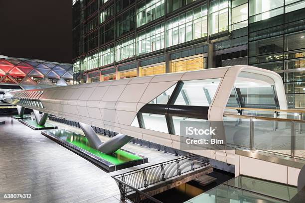 Modern Footbridge In Canary Wharf At Night London England Stock Photo - Download Image Now