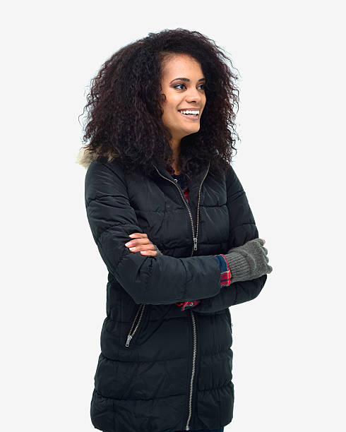 istock Smiling woman standing with arms crossed 638074924
