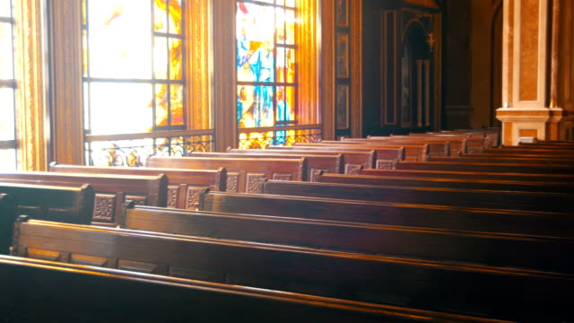 Wooden Pews in a Christian Church