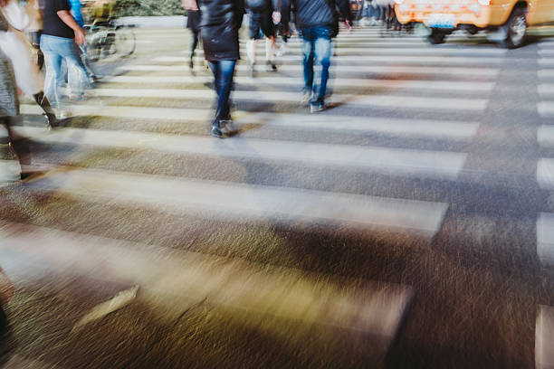 istock abstract blur people waking zebra crossing of modern city 638079908