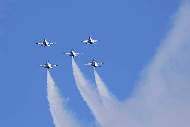 Huntington Beach, California,USA- October 22,2016. US Air Force Thunderbirds F-16 jet fighters performing at 2016 Huntington Beach Air Show in Southern California. The 2016 Huntington Beach Air Show features military aircraft and the US Air Force Thunderbirds performing free to the public.