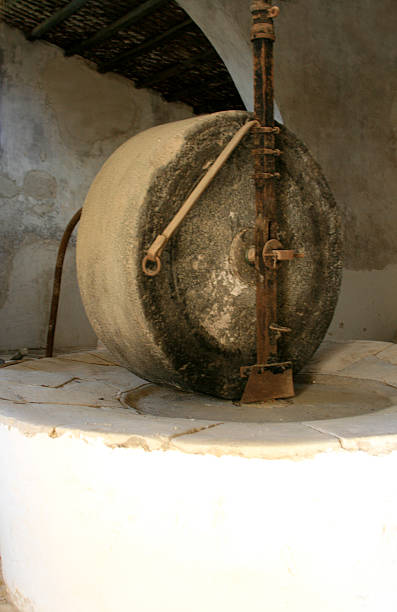 istock Sicily, Italy: Old Stone Wheel of Olive Oil Press 638084932