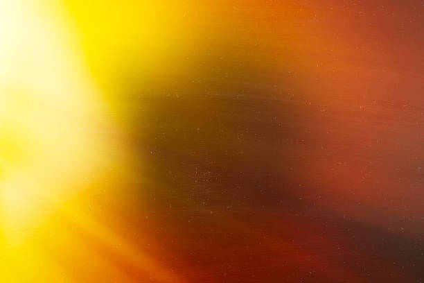 istock Horizontal orange dirty film scan textured background with light 638085198