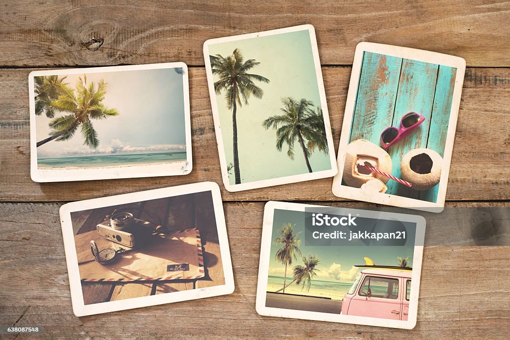 instant photo Summer photo album on wood table. instant photo of vintage camera - vintage and retro style Photographic Print Stock Photo