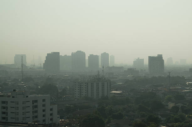 istock City styline with smok or fog 638090214