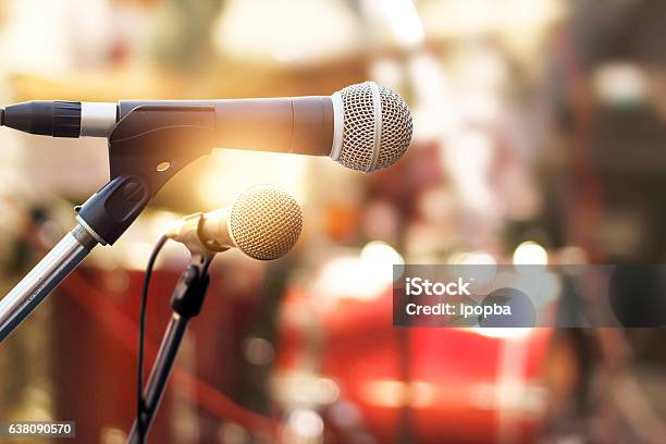 Microphone On Concert Stage Background Stock Photo - Download Image Now - Outdoors, Microphone, Stage - Performance Space