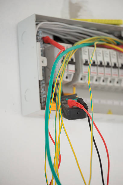 istock Electrical measurements in cabinet with multimeter 638096804