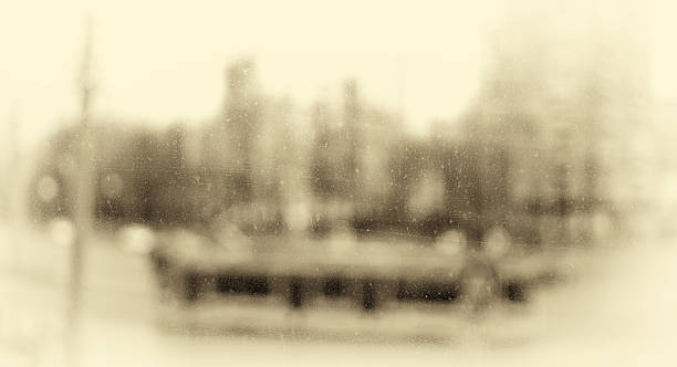 istock City traffic through dirty window  sepia bokeh background 638097608