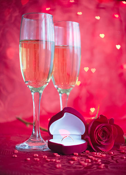 istock Romantic setup with champagne, rose and engagement ring 638098734