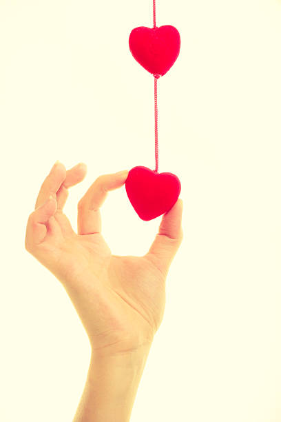 istock Female hand with little hearts. 638099026