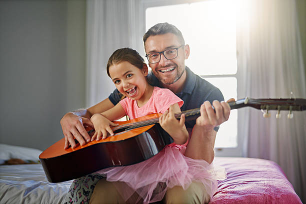 istock Dad gives the best guitar lessons! 638100944