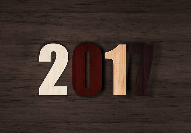 istock 2017 new year wooden background 638104600