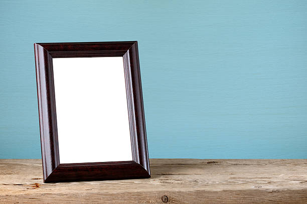 istock Photo frame on wooden table 638104744