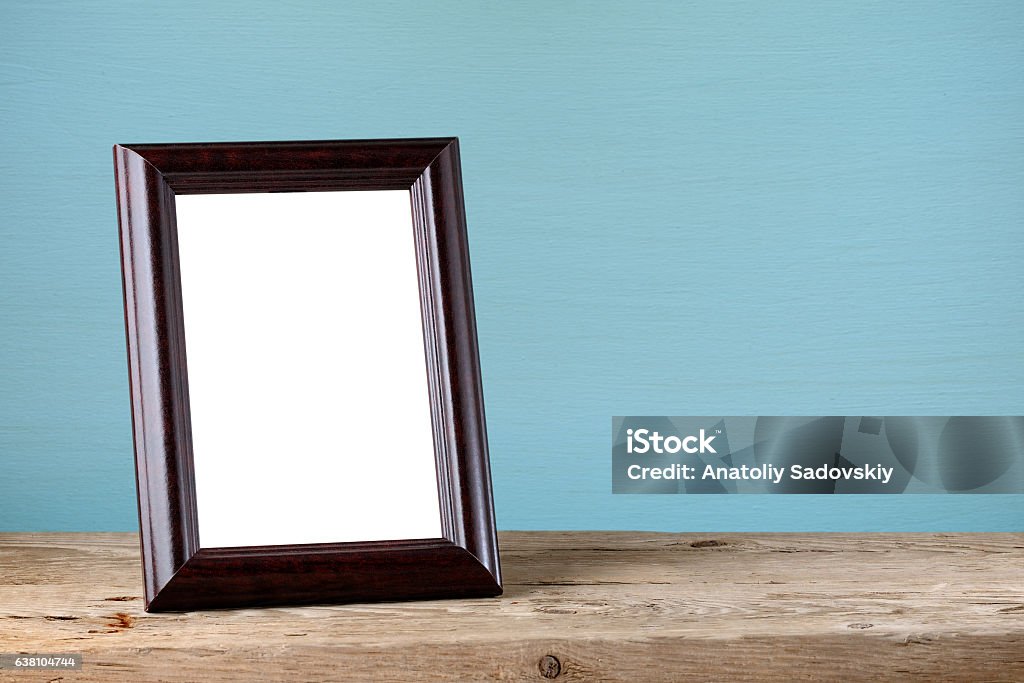 Photo frame on wooden table Picture Frame Stock Photo
