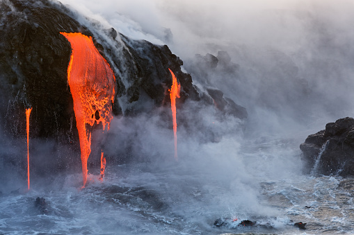 Lava from the Kilauea Volcano eruption in Hawaii entering the pacific ocean