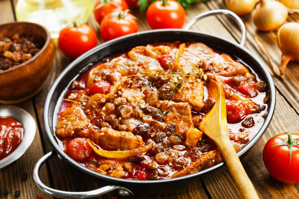 istock Pork stew with tomatoes and raisins 638109216