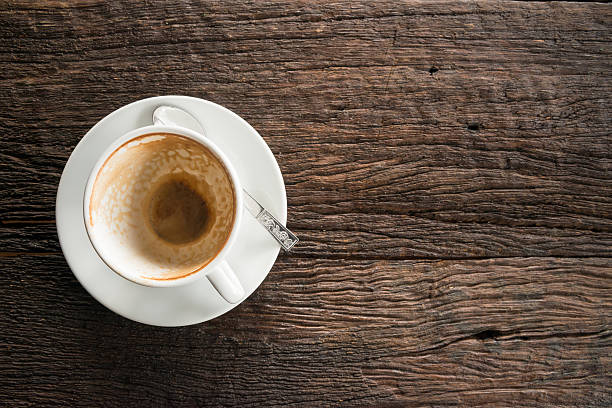 istock The empty cup of coffee on table wood. 638110898