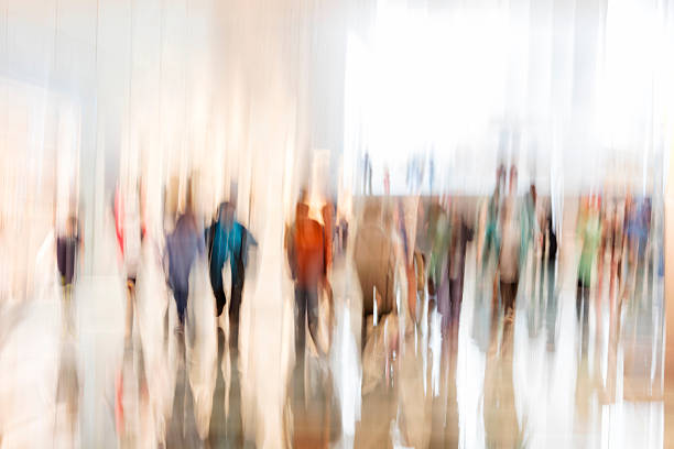 crowd of walking people - group of people art museum clothing lifestyles imagens e fotografias de stock