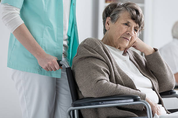 istock Woman on wheelchair 638112252