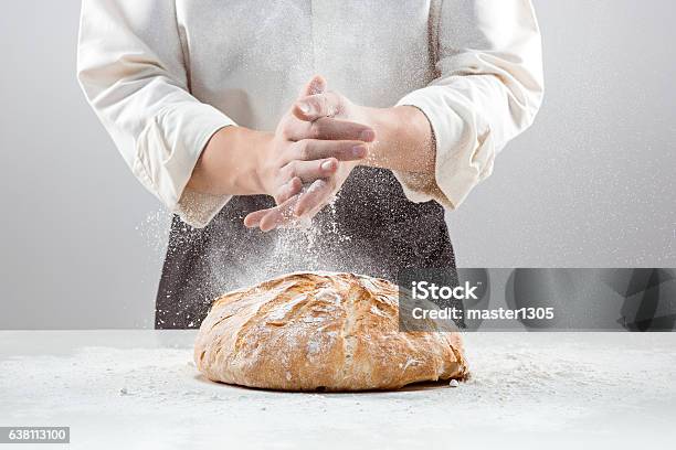The Male Hands In Flour And Rustic Organic Loaf Of Stock Photo - Download Image Now - Bakery, Baking Bread, Flour