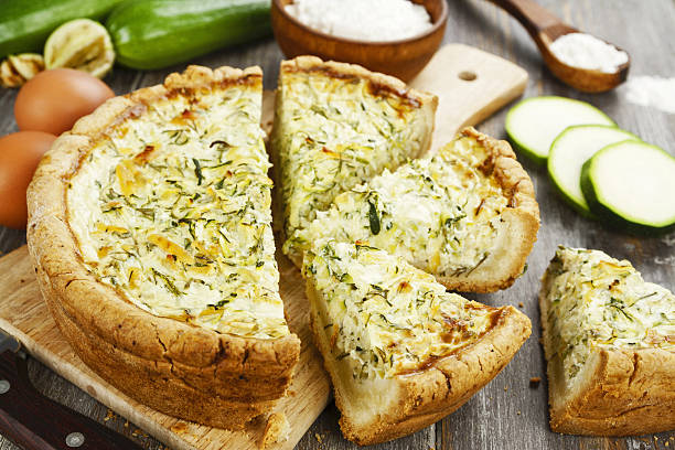 Pie with zucchini and herbs stock photo