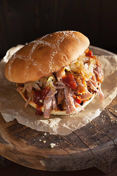 istock homemade pulled pork burger with caramelized onion and bbq sauce 638115354