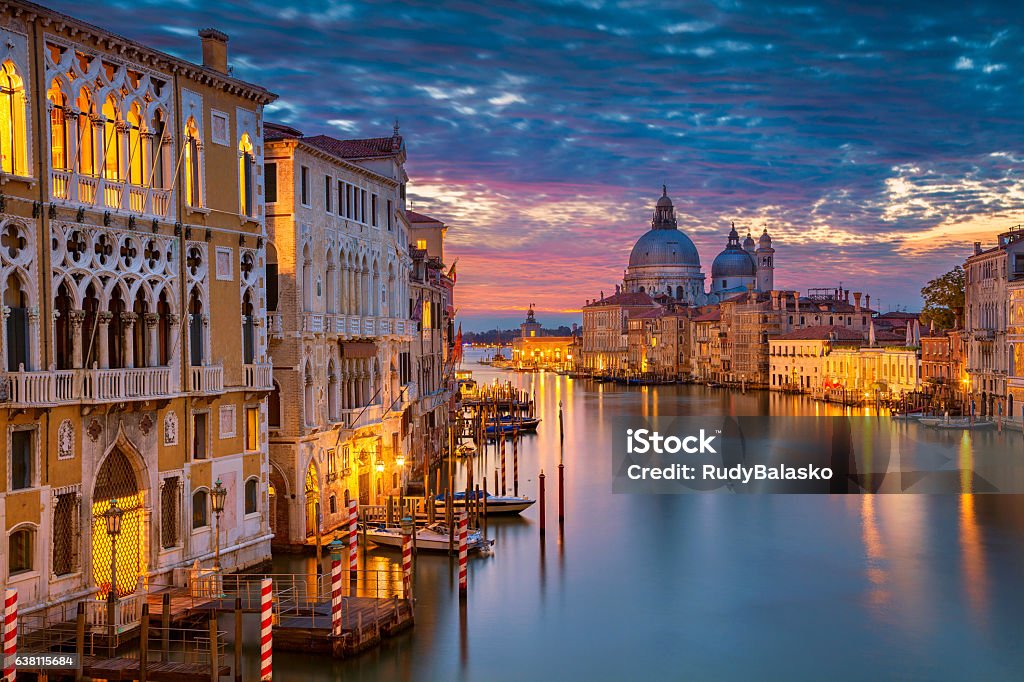 Venice. Cityscape image of Grand Canal in Venice, with Santa Maria della Salute Basilica in the background. Venice - Italy Stock Photo