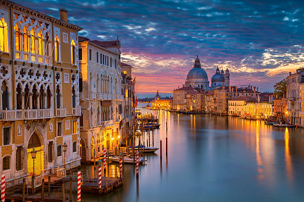 Venice. Cityscape image of Grand Canal in Venice, with Santa Maria della Salute Basilica in the background. venice italy stock pictures, royalty-free photos & images