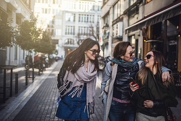 istock Friends walking in the city 638118676