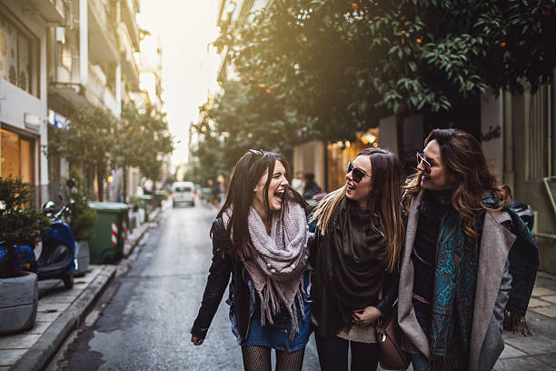 istock Friends walking in the city 638119976
