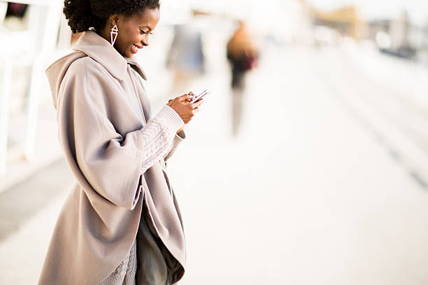 istock Young black woman taking selfie outdoor 638120110