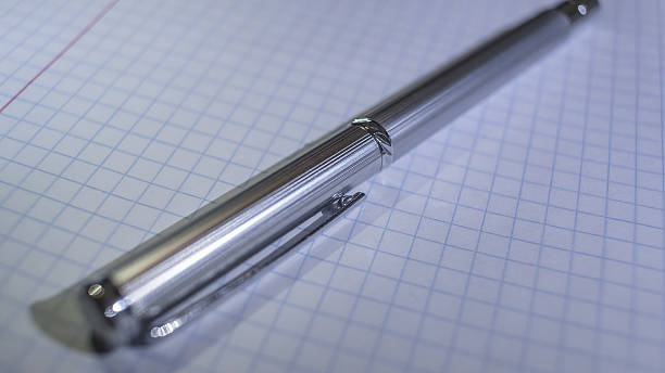istock Expensive metal pen on a notebook in the box 638120328