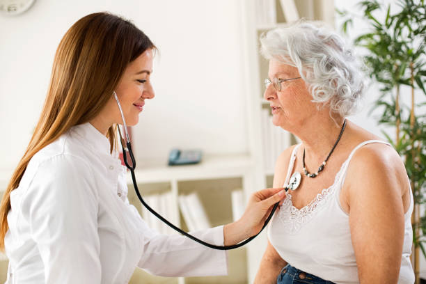 istock Senior woman visiting a doctor 638121364