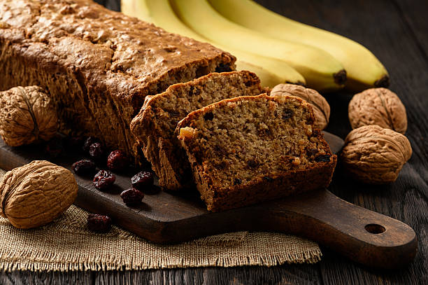 istock Homemade banana bread on wooden background. 638123768