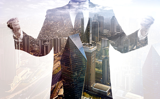 Businessman double exposure with city scape. 