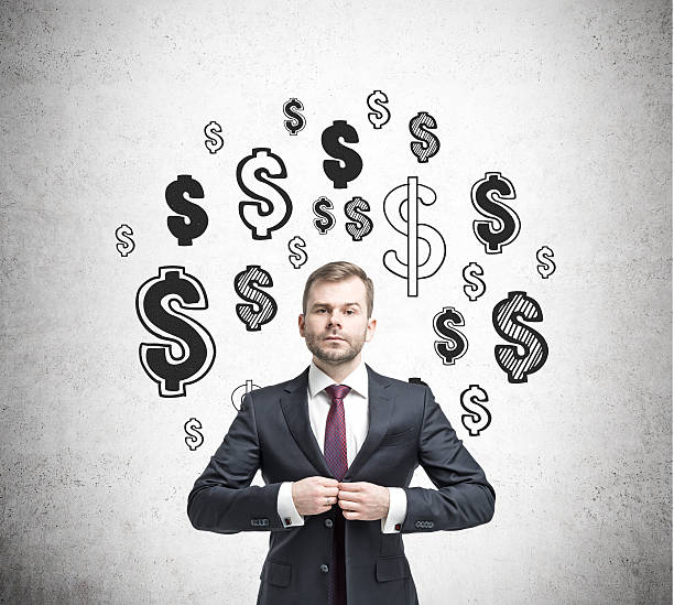 istock Businessman buttoning his vest and dollar sketches 638127788
