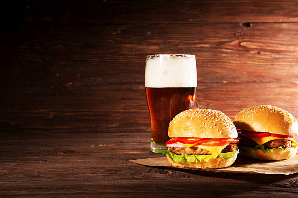 istock Hamburger and dark beer in vintage style 638128536