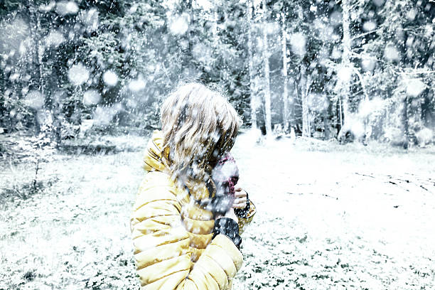Girl in nature filled with snow.