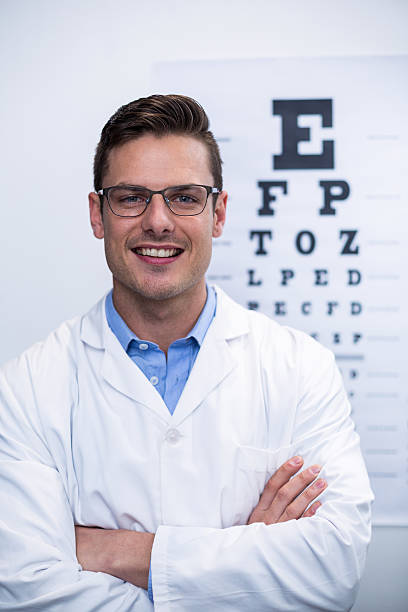 istock Optometrist smiling in ophthalmology clinic 638132070