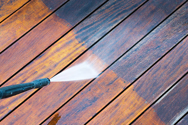 istock cleaning terrace with a pressure washer 638132280