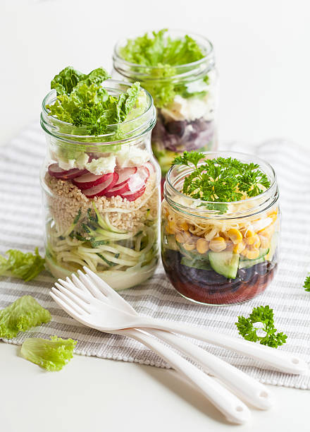 istock healthy vegetable cheese salad in mason jars 638134042