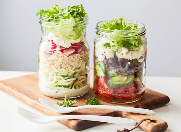 istock healthy vegetable cheese salad in mason jars 638134072