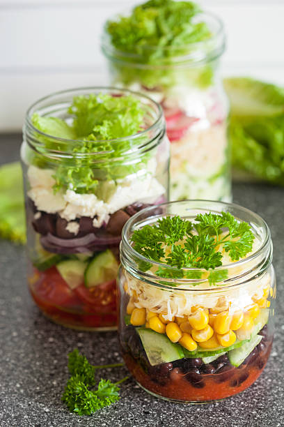 istock healthy vegetable cheese salad in mason jars 638134188