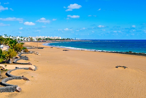 a view of the Playa de Matagorda beach in Puerto del Carmen, Lanzarote, in the Canary Islands, Spain