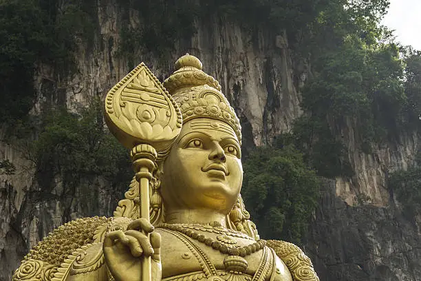 The head of the giant statue of hindu god Muragan at Batu caves, Kuala-Lumpur