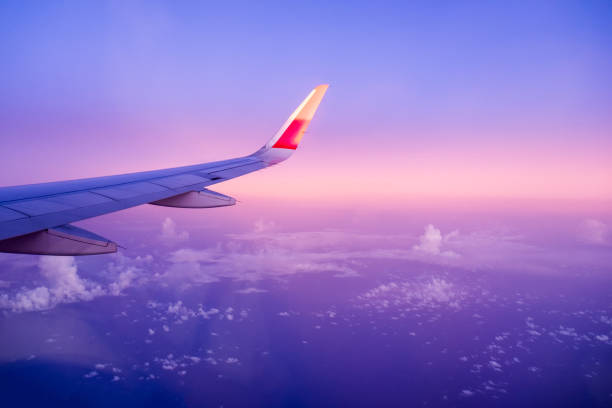 istock View airplane cloudy blue colorful 638137204