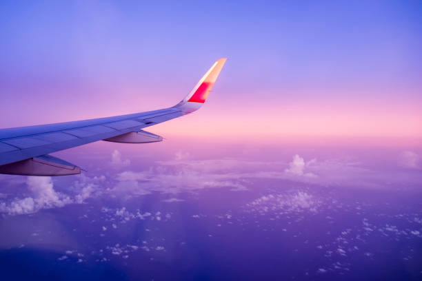 View airplane cloudy blue colorful View airplane cloudy blue colorful on sky stratosphere airplane cloudscape mountain stock pictures, royalty-free photos & images