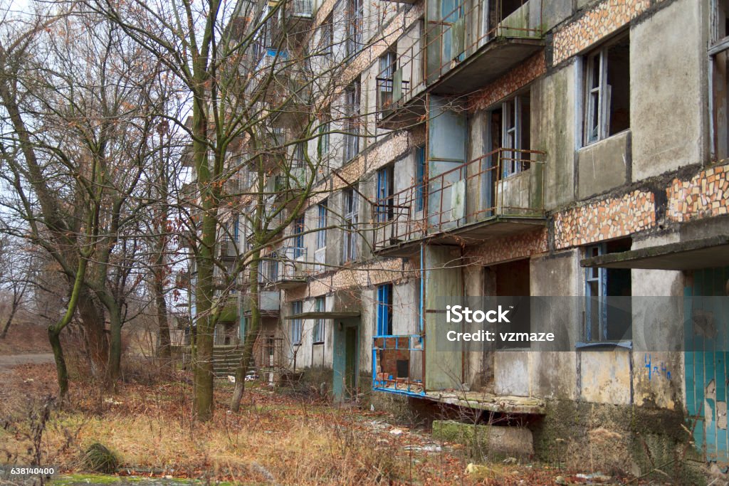 Forsaken and Deseted Building Forsaken and deserted living building without windows and doors in a ghost town in Ukraine Abandoned Stock Photo