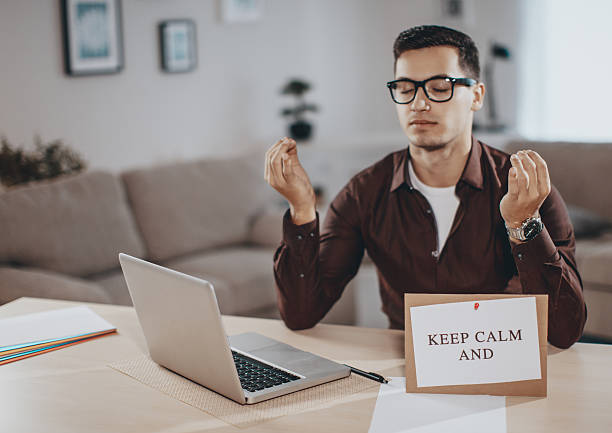 Keep Calm And... Young man with message the human body writing black human hand stock pictures, royalty-free photos & images