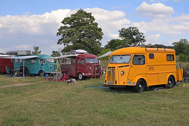 Classic Citroen HY vehicles on the camping Torun, Poland - July 29th, 2015: Classic Citroen HY vehicles parked on the camping during the 21. International Meeting of 2CV Friends. The HY (Type H) model was produced from 1947 to 1981. Today it is a cult car. citroen hy stock pictures, royalty-free photos & images